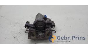 Gebruikte Remklauw (Tang) links-achter Ford C-Max (DXA) 1.0 Ti-VCT EcoBoost 12V 125 Prijs € 40,00 Margeregeling aangeboden door Autorec. Gebr. Prins b.v.