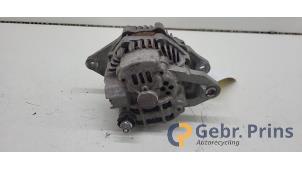 Dynamo van een Mitsubishi Colt (Z2/Z3) 1.3 16V 2011