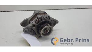 Dynamo van een Mitsubishi Colt (Z2/Z3) 1.3 16V 2011