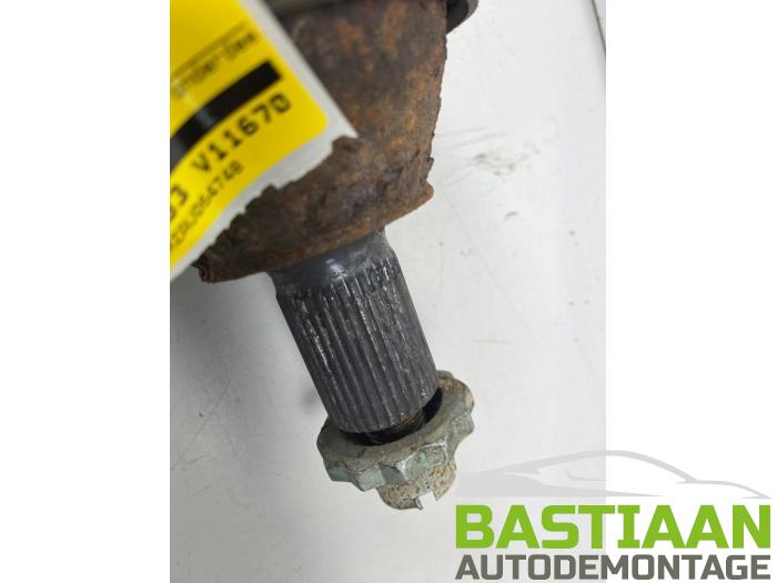 Aandrijfas links-voor van een Volkswagen Polo V (6R) 1.2 12V 2010