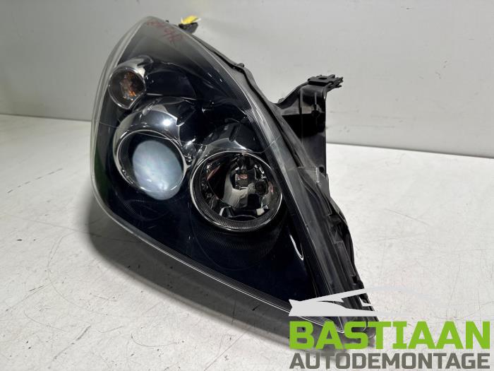 Koplamp rechts van een Opel Vectra C GTS 2.2 DIG 16V 2008