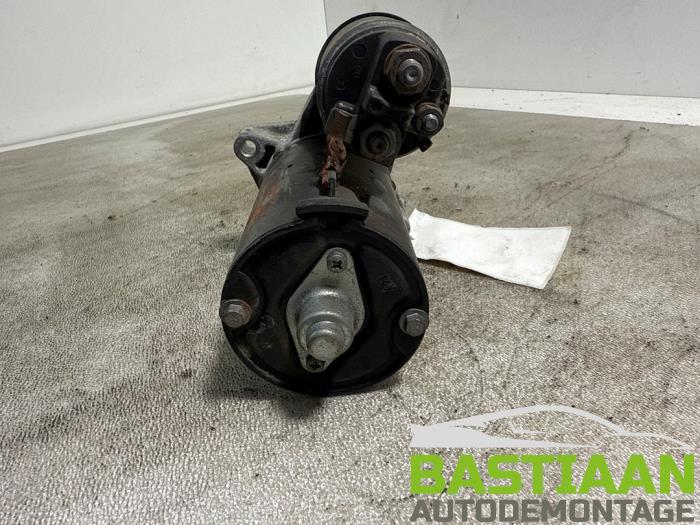 Startmotor van een Opel Astra J Sports Tourer (PD8/PE8/PF8) 1.3 CDTI 16V ecoFlex 2011