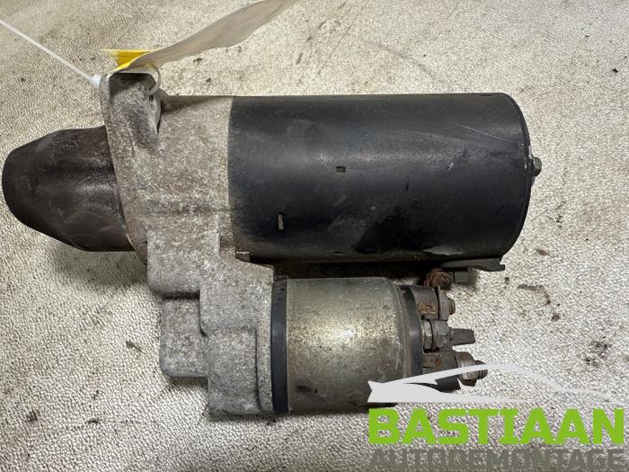 Startmotor van een Opel Astra J Sports Tourer (PD8/PE8/PF8) 1.3 CDTI 16V ecoFlex 2011