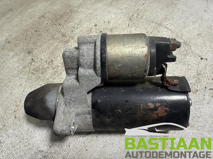 Startmotor van een Opel Astra J Sports Tourer (PD8/PE8/PF8) 1.3 CDTI 16V ecoFlex 2011