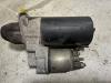 Startmotor van een Opel Astra J Sports Tourer (PD8/PE8/PF8) 1.3 CDTI 16V ecoFlex 2011