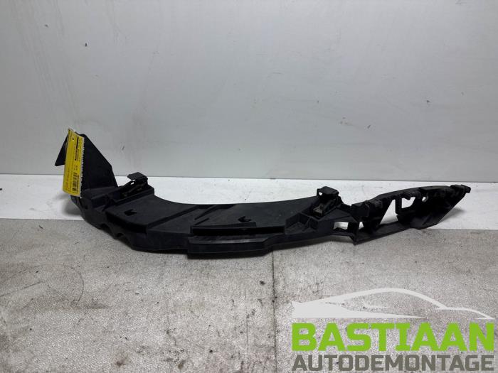 Koplampframe links van een Volkswagen Polo V (6R) 1.2 TDI 12V BlueMotion 2011