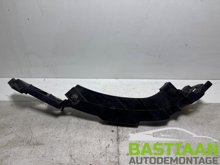 Koplampframe links van een Volkswagen Polo V (6R) 1.2 TDI 12V BlueMotion 2011