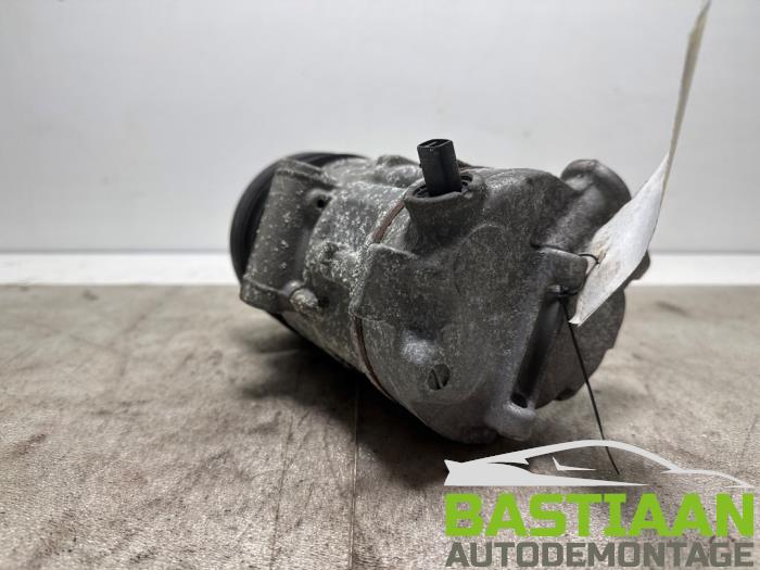 Aircopomp van een Opel Corsa D 1.2 16V 2013