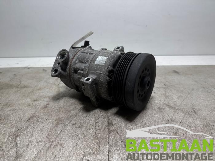 Aircopomp van een Opel Corsa D 1.2 16V 2013