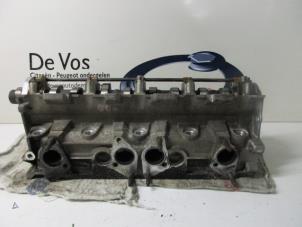 Gebruikte Cilinderkop Peugeot 309 Prijs € 160,00 Margeregeling aangeboden door De Vos Autodemontagebedrijf