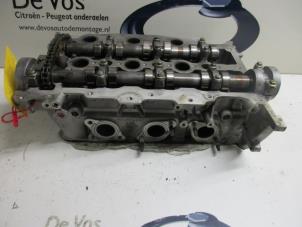 Gebruikte Cilinderkop Citroen C6 Prijs € 450,00 Margeregeling aangeboden door De Vos Autodemontagebedrijf