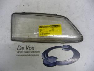 Gebruikte Koplampglas rechts Peugeot 306 (7B) 1.9 SLd,SRd,STd +Kat. Prijs € 25,00 Margeregeling aangeboden door De Vos Autodemontagebedrijf