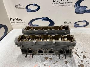 Gebruikte Cilinderkop Citroen C4 Berline (LC) 1.6 16V Prijs € 250,00 Margeregeling aangeboden door De Vos Onderdelen