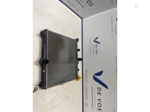 Gebruikte Radiateur Opel Corsa F (UB/UH/UP) 1.2 12V 75 Prijs € 100,00 Margeregeling aangeboden door De Vos Onderdelen