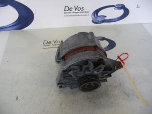 Gebruikte Dynamo Peugeot 205 II (20A/C) 1.6 XS,XT,GT Autom. Prijs € 55,00 Margeregeling aangeboden door De Vos Autodemontagebedrijf