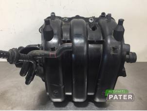 Gebruikte Inlaatspruitstuk Volkswagen Polo V (6R) 1.2 12V BlueMotion Technology Prijs € 78,75 Margeregeling aangeboden door Autoparts Pater