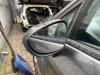 Buitenspiegel links van een Ford Fiesta 6 (JA8) 1.0 SCI 12V 80 2017