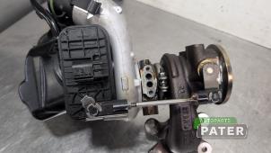 G-lader van een Audi Q3 (F3B) 1.4 45 TFSI e 16V 2022