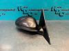 Buitenspiegel rechts van een BMW 1 serie (E87/87N) 118d 16V 2006
