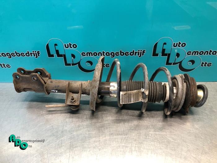 Schokdemperpoot links-voor van een Ford Ka II 1.2 2010