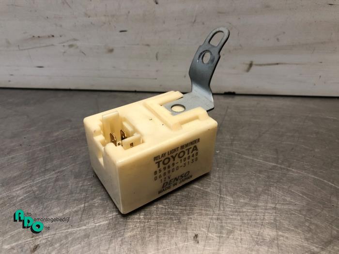 Kontaktslot + computer van een Toyota Starlet (EP9) 1.3,XLi,GLi 16V 1998