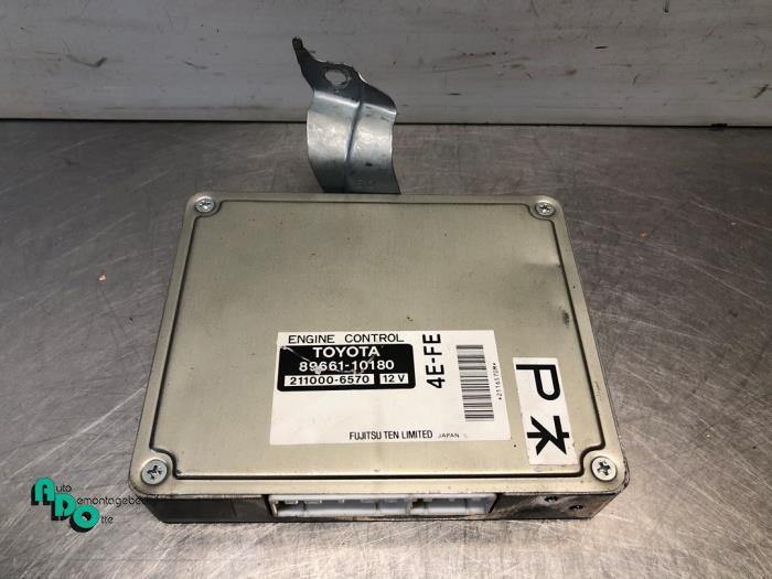 Kontaktslot + computer van een Toyota Starlet (EP9) 1.3,XLi,GLi 16V 1998