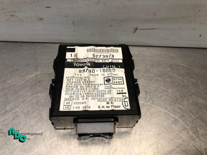 Kontaktslot + computer van een Toyota Starlet (EP9) 1.3,XLi,GLi 16V 1998