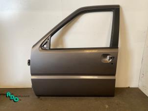 Gebruikte Portier 2Deurs links Nissan Terrano II (R20/TR50) 2.7 TDi Prijs € 100,00 Margeregeling aangeboden door Autodemontagebedrijf Otte