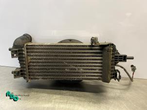 Intercooler van een Ford Focus 3 Wagon 1.0 Ti-VCT EcoBoost 12V 125 2013