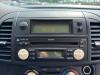 Radio CD Speler van een Nissan Micra (K12), 2003 / 2010 1.2 16V, Hatchback, Benzine, 1.240cc, 59kW (80pk), FWD, CR12DE, 2003-01 / 2010-06, K12BB02; K12FF02; K12FF03 2005