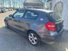BMW 1 serie (E81) 118d 16V Schokbreker links-achter