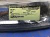 Koplamp links van een Mazda 626 (GE14/74/84) 1.8i LX,GLX 16V 1997