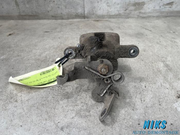 Remklauw (Tang) links-achter van een Skoda Octavia Combi (5EAC) 2.0 TDI GreenTec 16V 2013