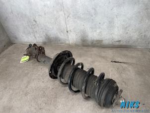 Gebruikte Schokdemperpoot rechts-voor Opel Corsa D 1.0 Prijs op aanvraag aangeboden door Niks autodemontage