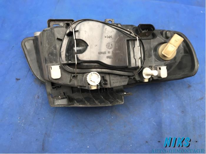 Koplamp links van een Seat Ibiza II Facelift (6K1) 1.6 2000