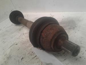 Gebruikte Aandrijfas links-voor Ford Focus 2 1.4 16V Prijs € 35,00 Margeregeling aangeboden door Autodemontage de Zaag