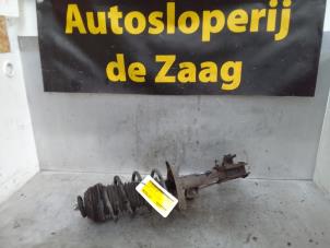 Gebruikte Schokdemperpoot rechts-voor Opel Corsa D 1.0 Prijs € 35,00 Margeregeling aangeboden door Autodemontage de Zaag