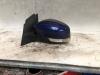 Buitenspiegel links van een Ford Focus 3 1.0 Ti-VCT EcoBoost 12V 125 2014