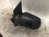 Buitenspiegel links van een Ford Focus 2 Wagon 1.6 TDCi 16V 90 2008