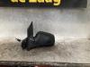 Buitenspiegel links van een Ford Focus 2 Wagon 1.6 TDCi 16V 90 2008