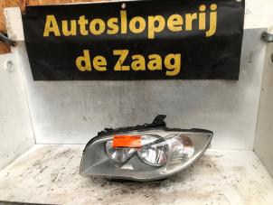 Gebruikte Koplamp links BMW 1 serie (E87/87N) 116i 1.6 16V Prijs € 100,00 Margeregeling aangeboden door Autodemontage de Zaag