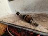 Opel Corsa D 1.2 16V Aandrijfas links-voor