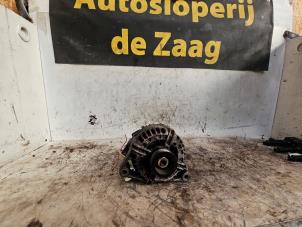 Gebruikte Dynamo Opel Corsa C (F08/68) 1.0 12V Twin Port Prijs € 35,00 Margeregeling aangeboden door Autodemontage de Zaag
