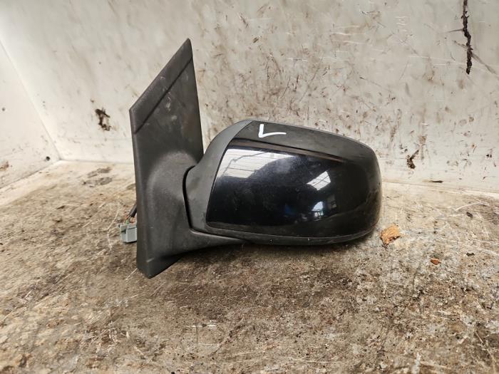 Buitenspiegel links van een Ford Focus 2 Wagon 1.6 16V 2006