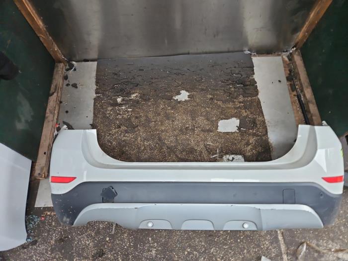 Achterbumper van een BMW X1 (E84) sDrive 18d 2.0 16V 2015