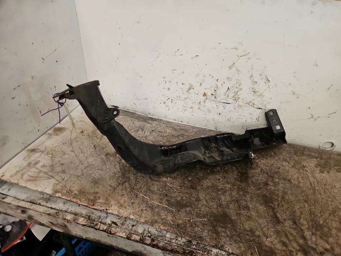 Koplampframe links van een BMW X1 (E84) sDrive 18d 2.0 16V 2015