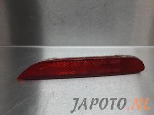 Gebruikte Bumper reflector links-achter Nissan Qashqai (J11) 1.6 dCi All Mode 4x4-i Prijs € 14,95 Margeregeling aangeboden door Japoto Parts B.V.
