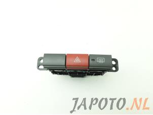 Gebruikte Paniekverlichtings Schakelaar Daihatsu Cuore (L251/271/276) 1.0 12V DVVT Prijs € 9,99 Margeregeling aangeboden door Japoto Parts B.V.