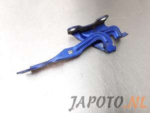 Gebruikte Motorkap Scharnier Mazda CX-7 2.3 MZR DISI Turbo 16V Prijs € 52,45 Margeregeling aangeboden door Japoto Parts B.V.