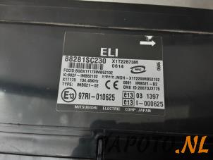 Kontaktslot + computer van een Subaru Forester (SH) 2.0D 2011